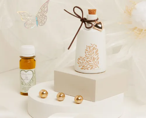 BOMBONIERA MATRIMONIO CLARALUNA 2025 OLIERA GRANDE DECORO CUORE CON OLIO 100ML